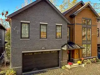 Sunlit Beauty with Waterfall Views