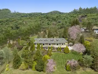 Exquisite English-style Country Estate Overlooking Laurel Ridge Country Club