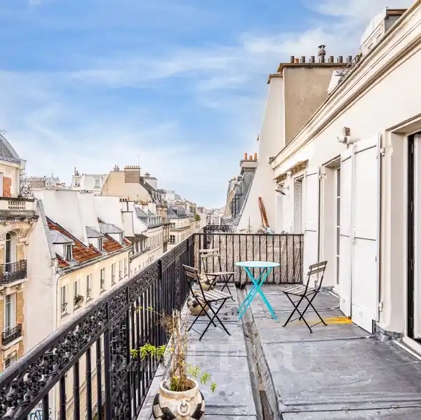 ELEGANT DINING ROOM ADJACENT TO CONTEMPORARY KITCHEN
