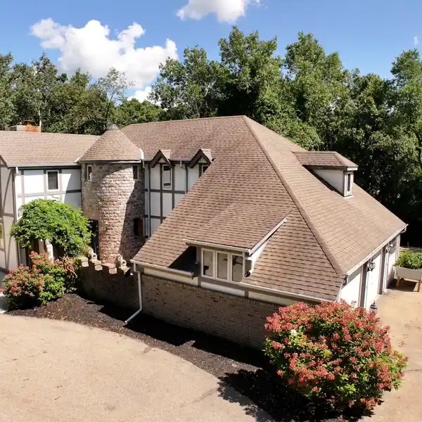 UNIQUE CUSTOM HOME ON NEARLY NINE ACRES