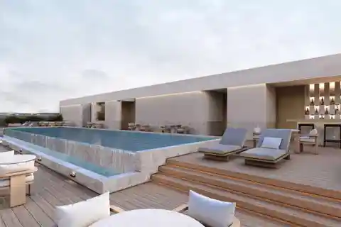 Furnished Coastal Flat with Rooftop Oasis