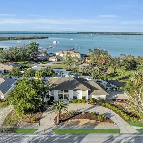 EXCEPTIONAL CUSTOM HOME ON A SPACIOUS CORNER LOT