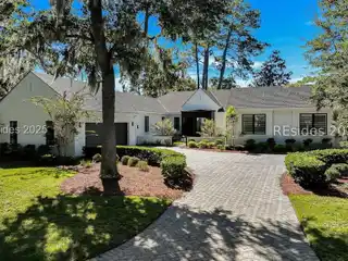 Modern Lakeside Living: 3 Bedrooms, Flex Room, Designer Kitchen & Year-Round Lanai