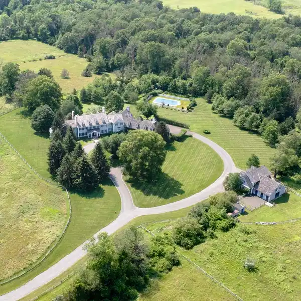 EXQUISITE COLONIAL REVIVAL ESTATE ON 43 ACRES