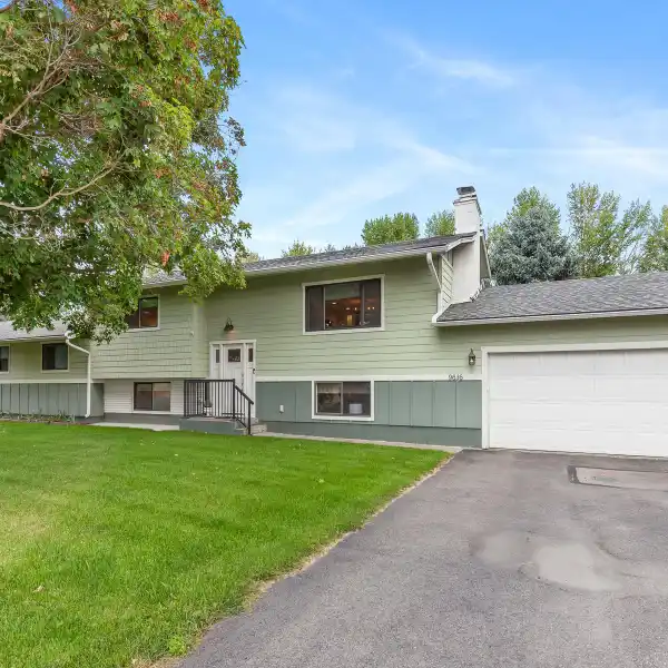 TWO HOMES IN ONE ON 3.32 ACRES