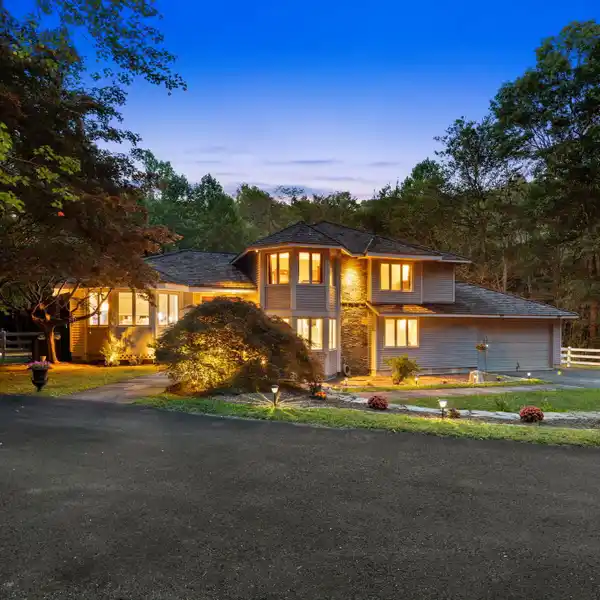 MODERN COLONIAL WITH POOL, BALCONY, AND BROOK VIEWS