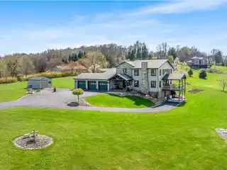 One-of-a-kind Custom Farmhouse on 11.5 Acres