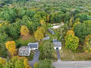 Unique Offering with Antique Home and Multiple Outbuildings