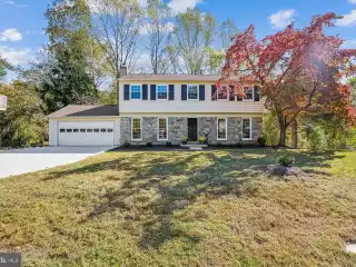 Renovated Cul-De-Sac Colonial with Streamside Views