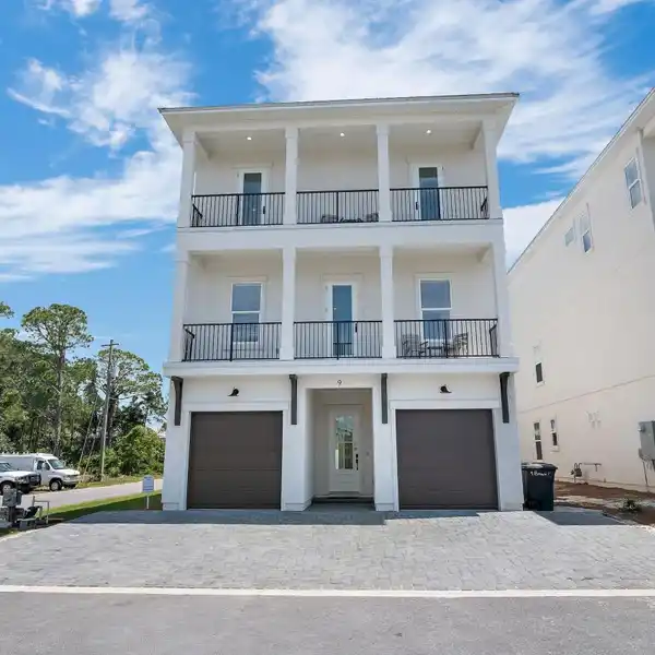 ELEGANT THREE-STORY OASIS WITH OUTDOOR BLISS