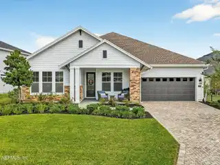 Luxury Living in This Exquisite Waterfront Pool Home