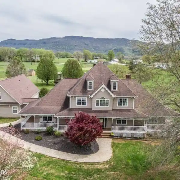 STUNNING MOUNTAIN ESTATE WITH PRIVATE STOCKED LAKE