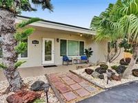 UPGRADED HOME IN PRESTIGIOUS HILLSBORO SHORES