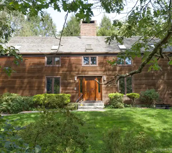 ONE-OF-A-KIND CUSTOM BUILT BARN HOME ON FIVE SECLUDED ACRES