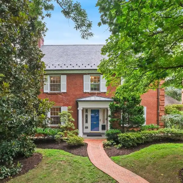 STATELY BRICK COLONIAL WITH SERENE BACKYARD RETREAT
