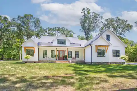 Modern Design and Rustic Charm over 11 Acres of Lush Landscape