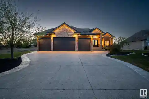 Custom Riverstone Bungalow with Backyard Oasis