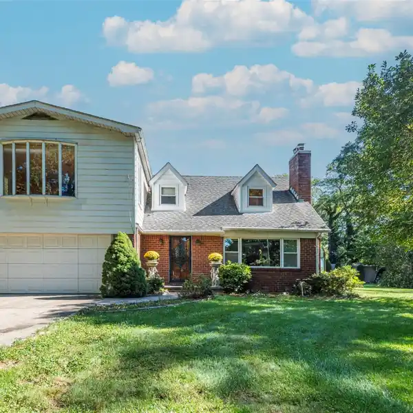 RARE COUNTRY-STYLE LIVING ON A QUIET, TREE-LINED ROAD
