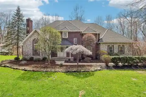 Magnificent Brick and Stone Home on over Four Acres