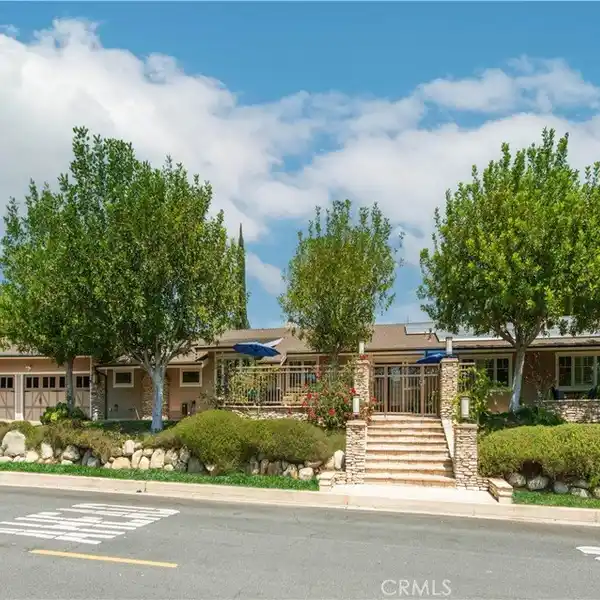 INDOOR-OUTDOOR FLOW WITH EXPANSIVE COVERED PATIO