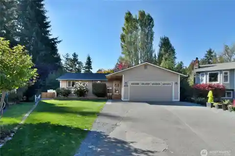 4-Bedroom Home with Bonus Room, Deck & Spacious Yard