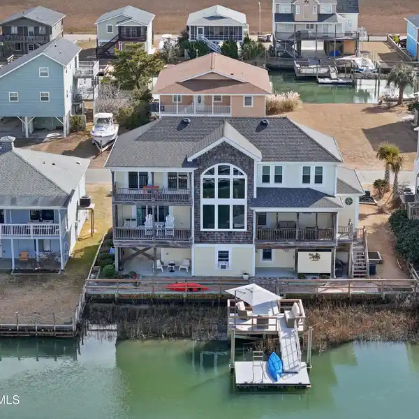 METICULOUSLY CARED FOR CANAL-FRONT HOME