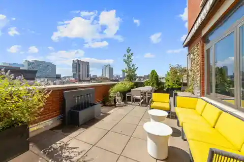 Loft-Like Residence with Wraparound Terrace