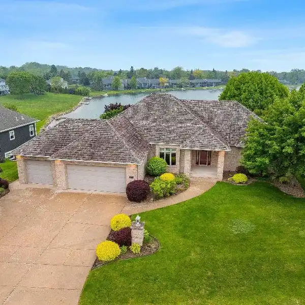 CUSTOM WALKOUT RANCH WITH PRIVATE DOCK