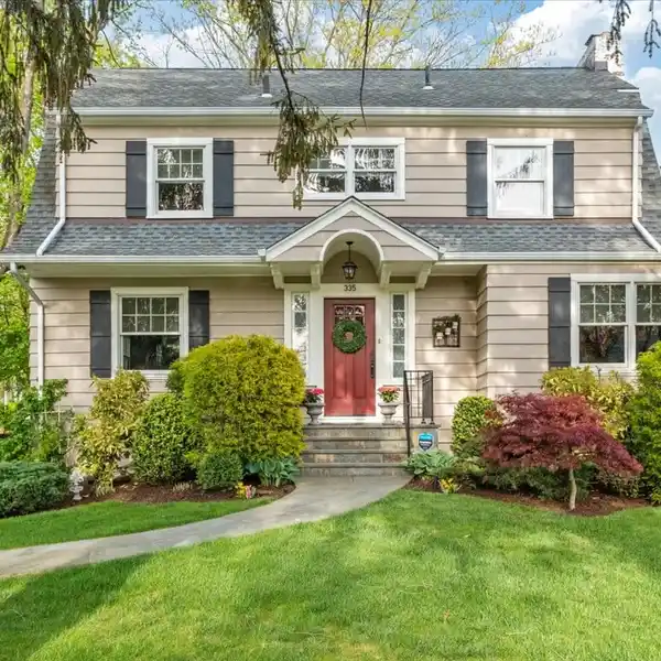 PICTURESQUE CENTER HALL COLONIAL
