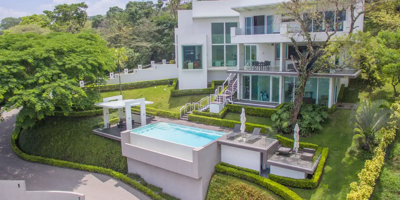Wondrous Home Surrounded by a Green Garden