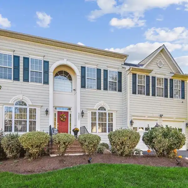 COLONIAL-STYLE RESIDENCE ON A DESIRABLE CORNER LOT