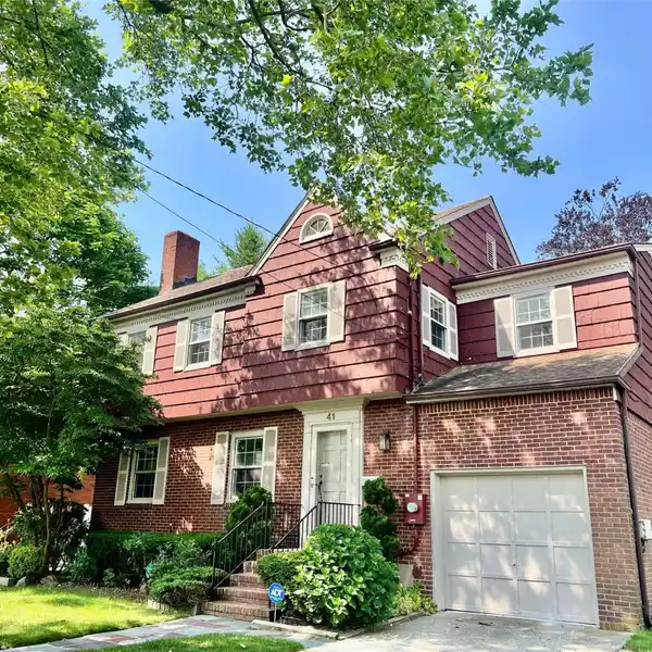 CLASSIC SIDE HALL COLONIAL ON A SPACIOUS LOT