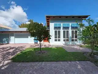 Waterfront Home with Eclectic Coastal Design