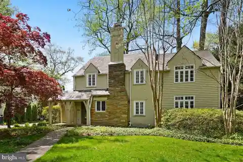 Charming Tudor with Spacious Backyard Oasis
