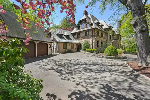 Stunning Tudor Mansion in a Prestigious Neighborhood