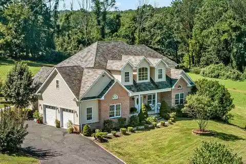 Builder’s Private 7-Acre Custom Estate