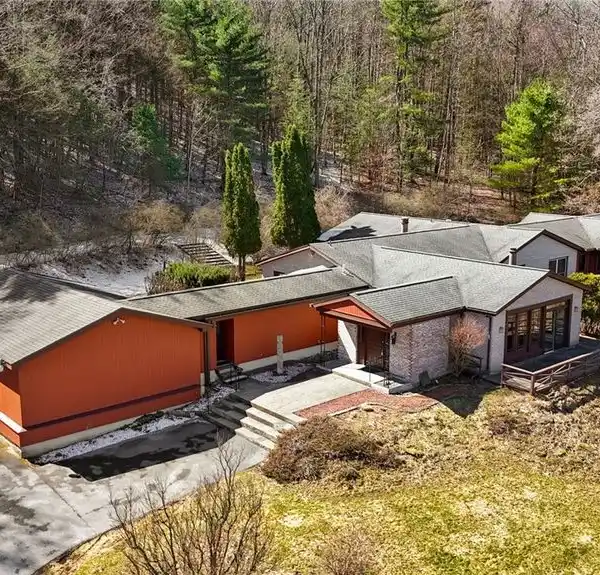 RAMBLING RANCH-STYLE HOME ON EIGHT-PLUS ACRES