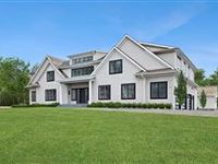 MODERN MASTERPIECE ON EXPANSIVE ACREAGE IN WATER MILLS
