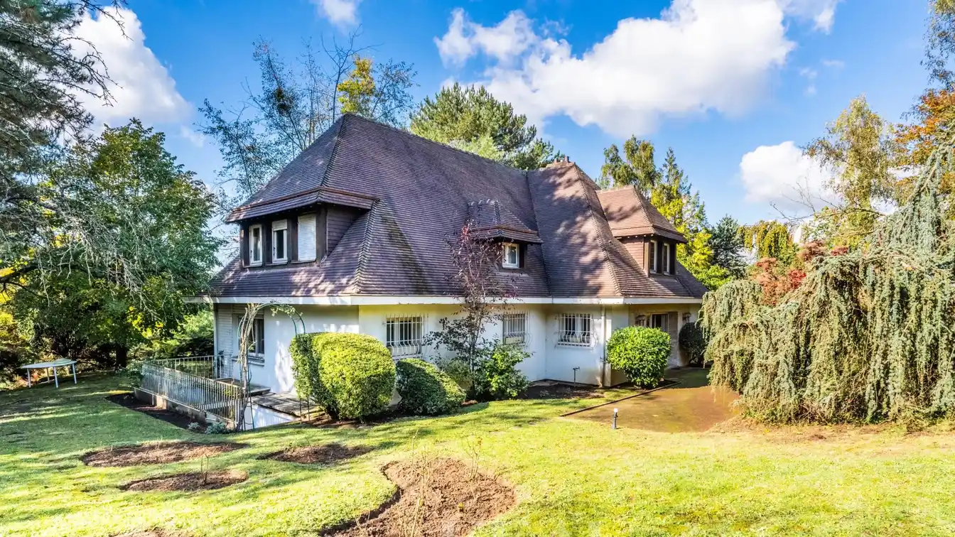 Opportunity to Renovate a Home in a Lush Setting