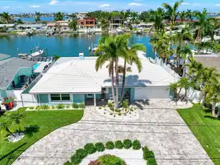 Magnificent Waterfront Home in Coveted Oakhurst Shores
