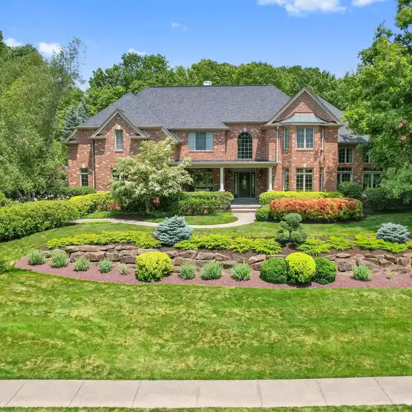 BEAUTIFULLY APPOINTED CUSTOM BUILT ALL BRICK HOME