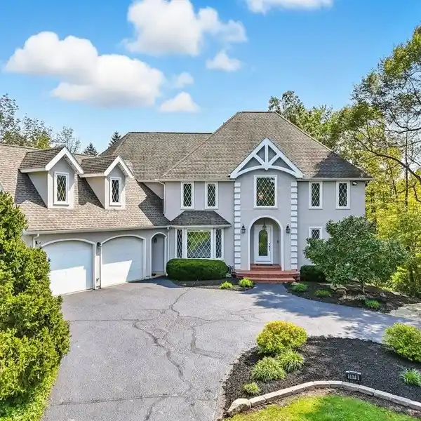 BEAUTIFUL COLONIAL HOME SITUATED ON THREE PICTURESQUE ACRES