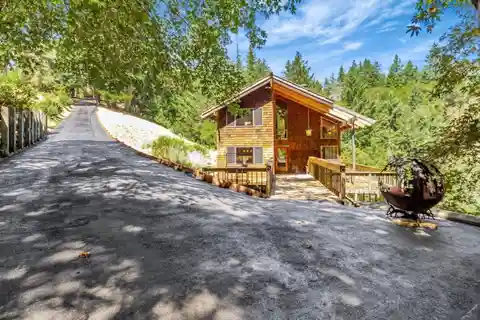 Elegant Home Featuring High-Beam Ceilings & Natural Light