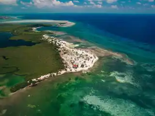 14 Acres with Expansive Beach