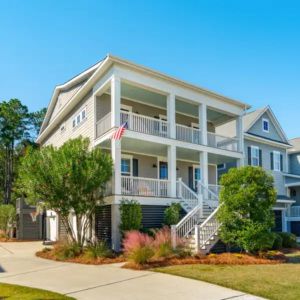 ELEVATED LOWCOUNTRY ELEGANCE IN HIGHLY DESIRABLE COMMUNITY