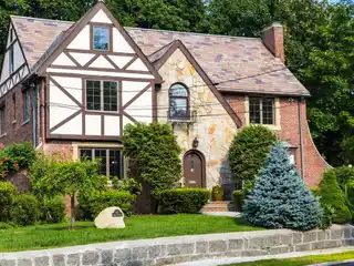Stunning Brick Tudor Home on a Magnificent Corner Lot