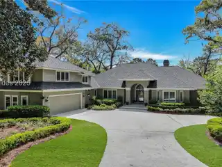 Updated Residence with Sweeping Fairway and Lagoon Views