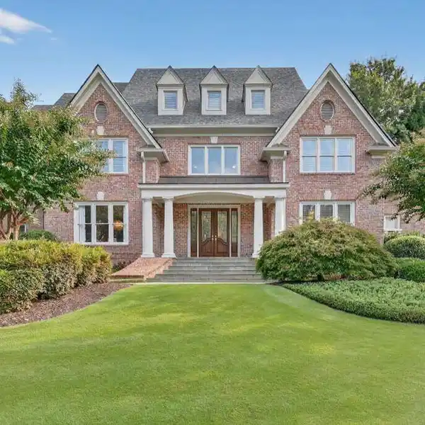 RESORT-STYLE LIVING IN GATED RIVERFRONT RETREAT