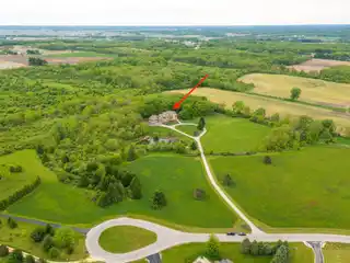 Versatile Estate on Private Acreage with Views