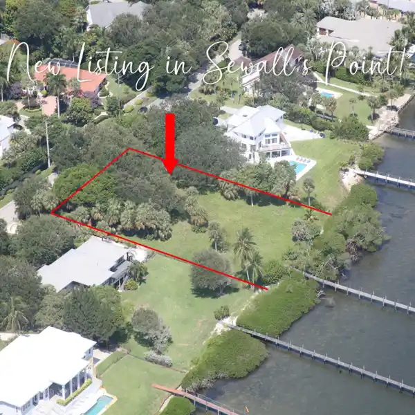 OVERSIZED WATERFRONT LOT WITH INCREDIBLE POTENTIAL AND DOCK